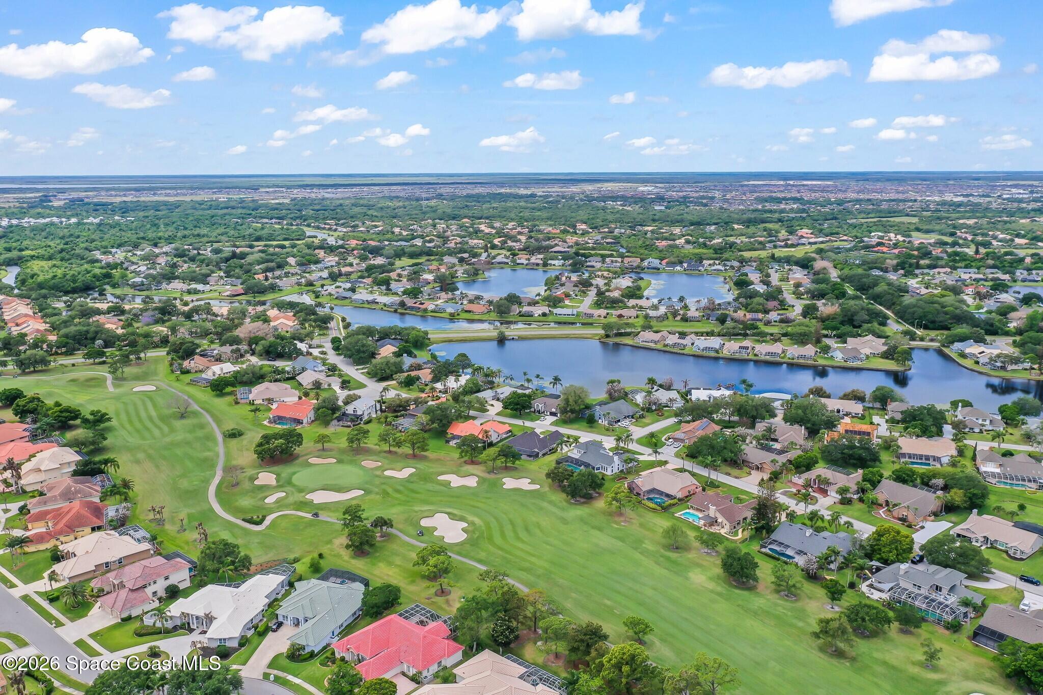 697 Spring Lake Drive Melbourne, FL 32940 - Photo 40 of 45 an aerial view of a city