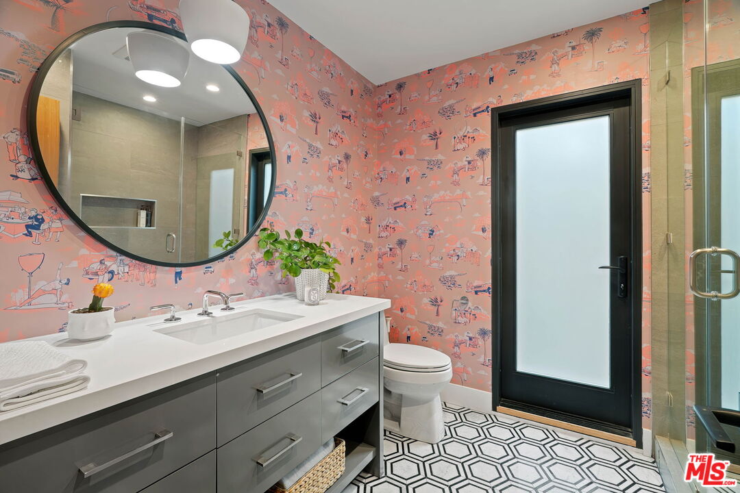 3056 Arrowhead Drive Los Angeles, CA 90068 - Photo 21 of 35 a bathroom with a sink and a mirror