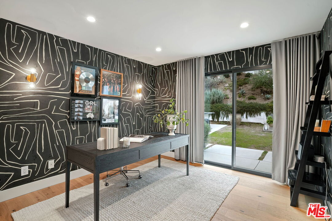 3056 Arrowhead Drive Los Angeles, CA 90068 - Photo 22 of 35 a livingroom with furniture wooden floor and a floor to ceiling window