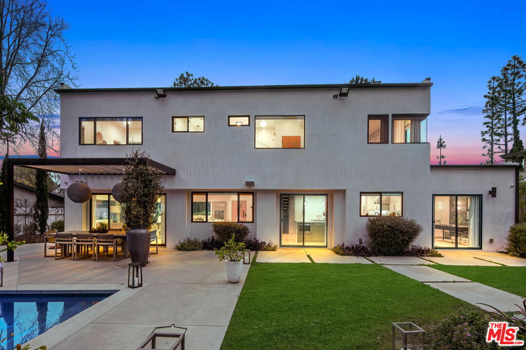 3056 Arrowhead Drive Los Angeles, CA 90068 - Photo 32 of 35 a front view of a house with a yard