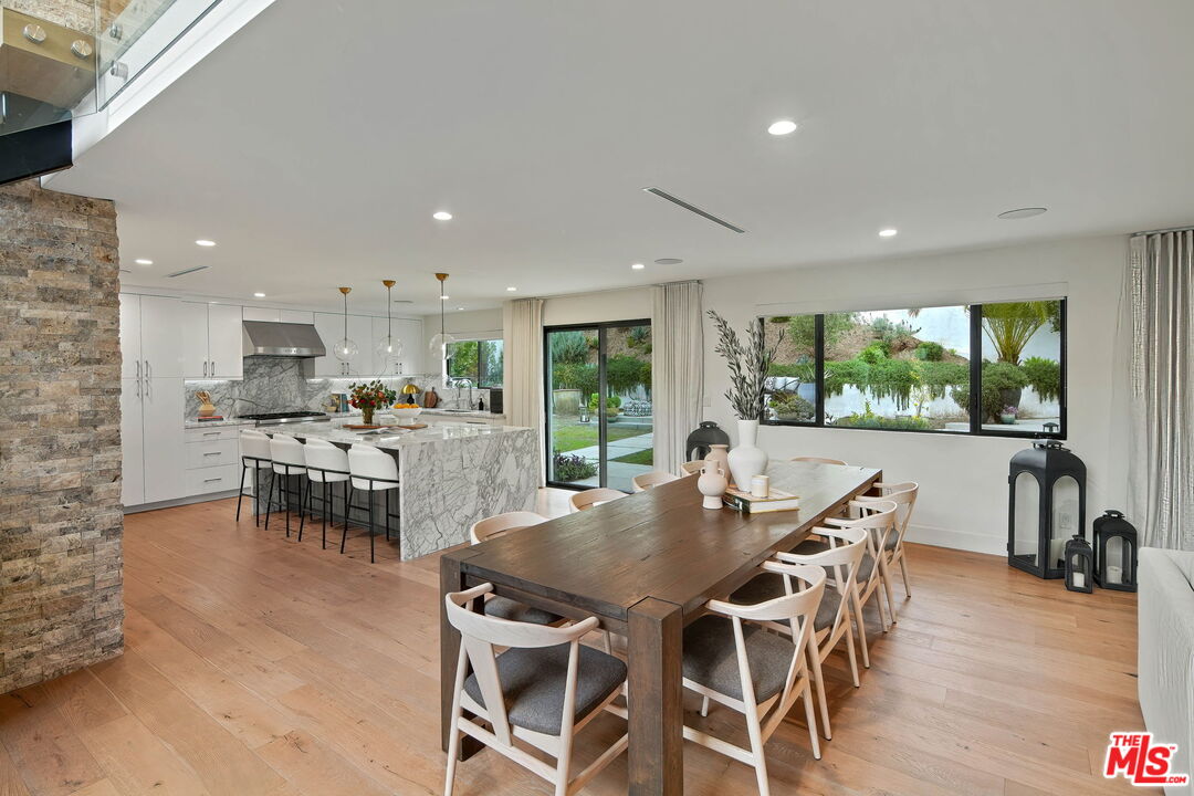 3056 Arrowhead Drive Los Angeles, CA 90068 - Photo 9 of 35 a dining room with furniture and wooden floor