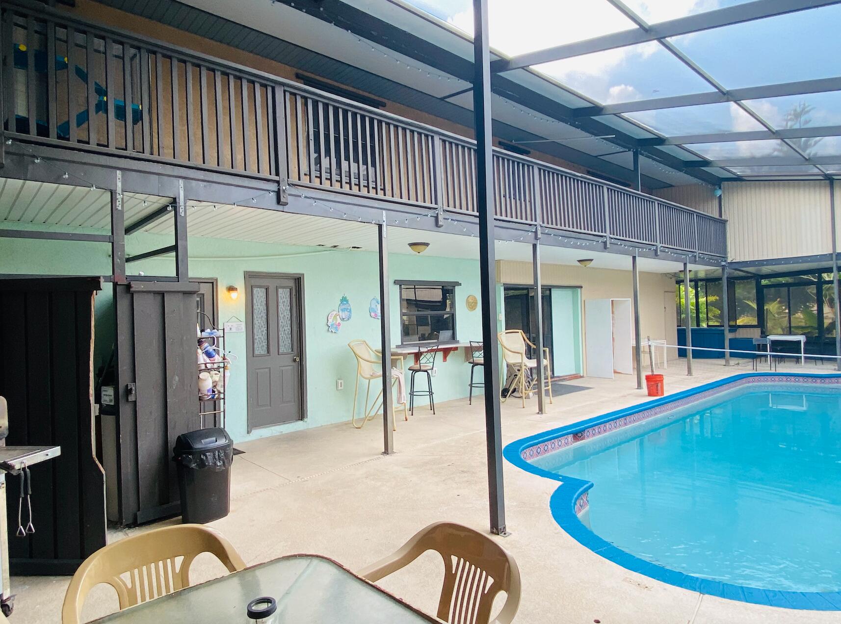 1477 Southwest Gilroy Road Port St. Lucie, FL 34953 - Photo 25 of 49 Poolside 1