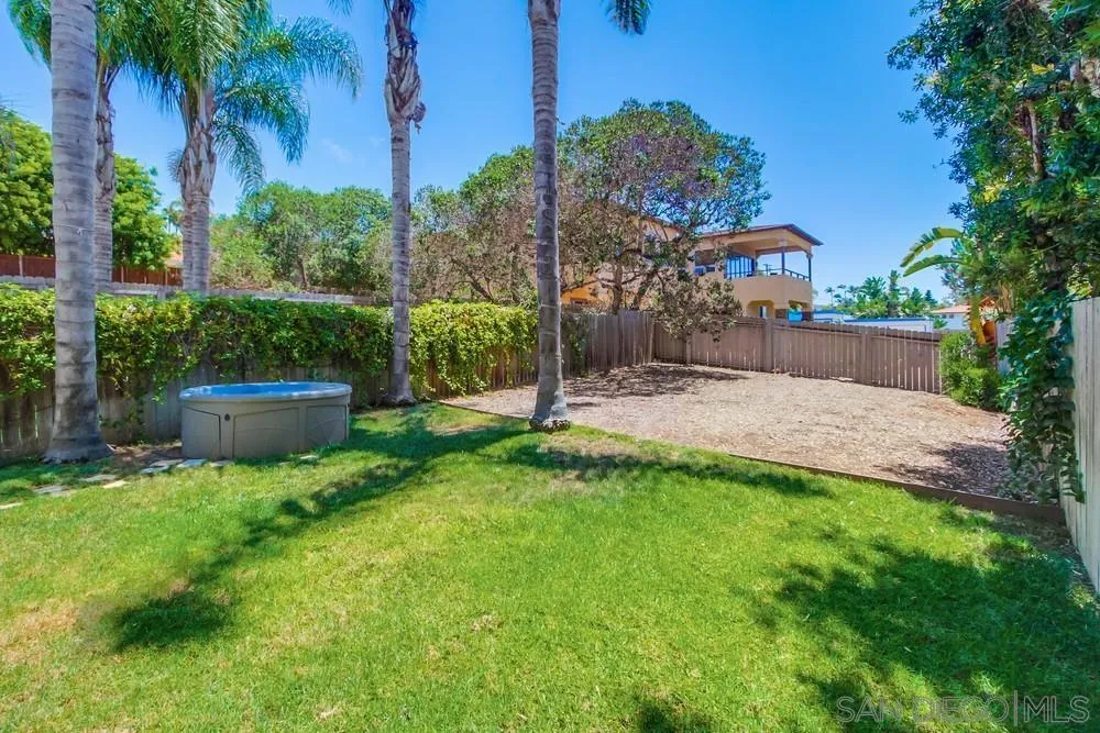 303-305 Sanford Street Encinitas, CA 92024 - Photo 20 of 41 a garden view with a seating space
