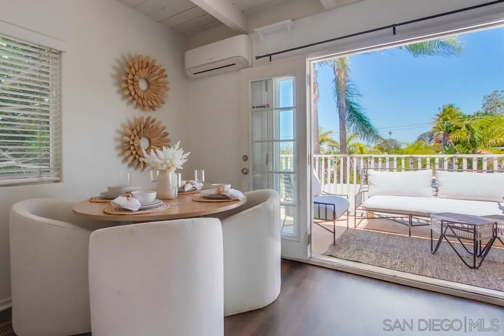 303-305 Sanford Street Encinitas, CA 92024 - Photo 7 of 41 a dining room with furniture and a floor to ceiling window