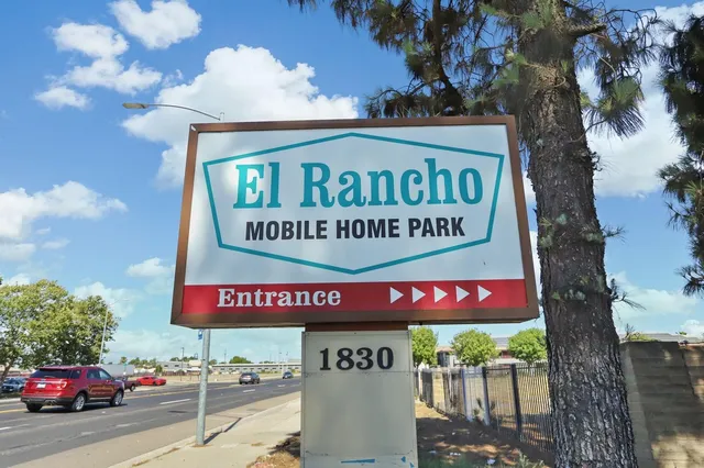 a sign on the side of a street