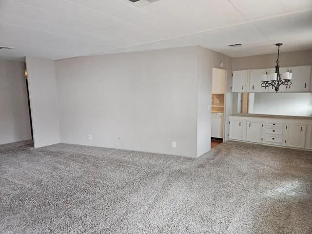 a view of a kitchen with a sink