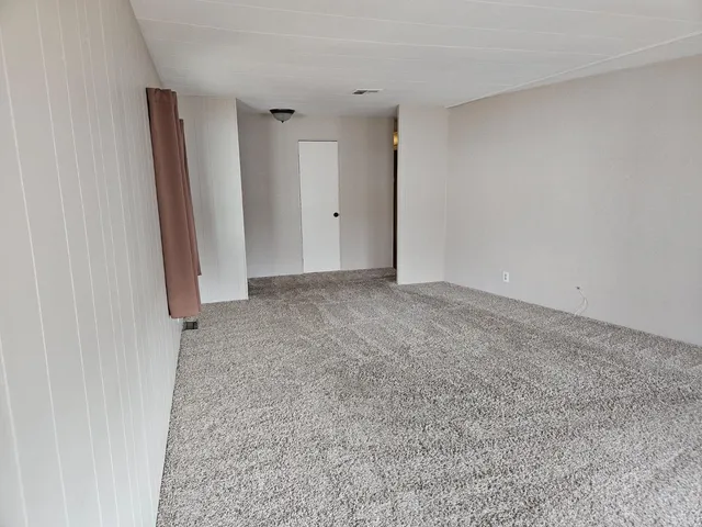 an empty room with a door