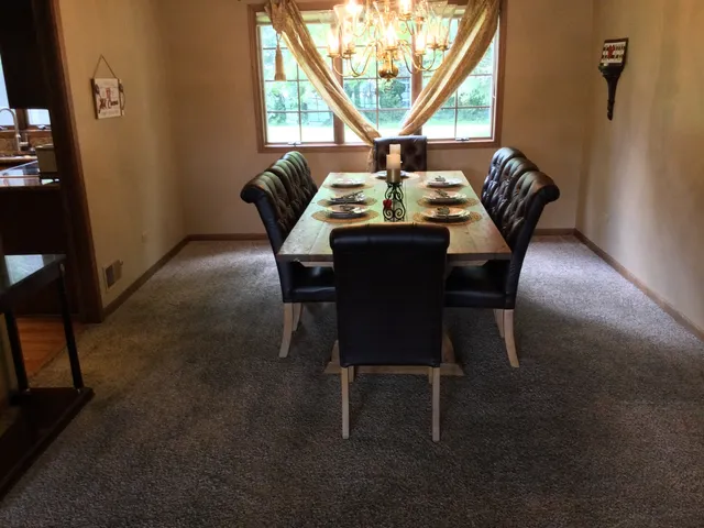 a kitchen with granite countertop wooden cabinets and a granite counter tops