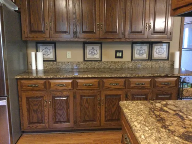 a kitchen with a sink and a stove