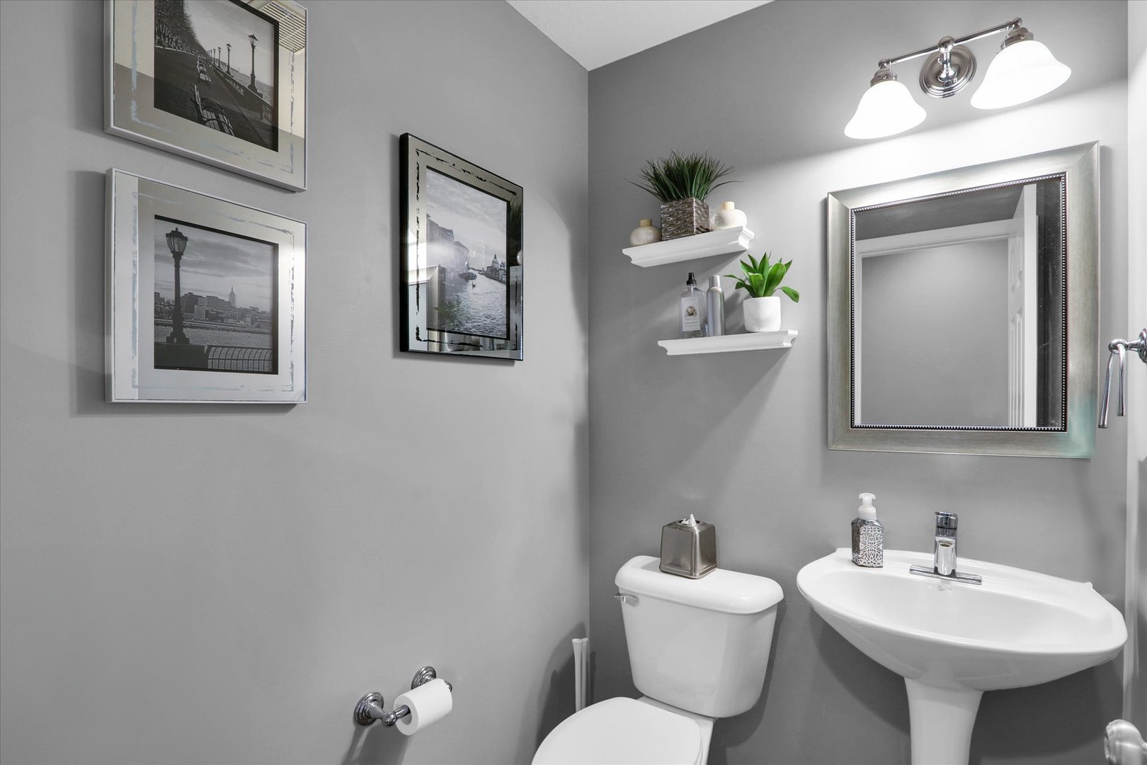 3808 Pebblebrook Lane Champaign, IL 61822 - Photo 16 of 31 a bathroom with a toilet sink and mirror