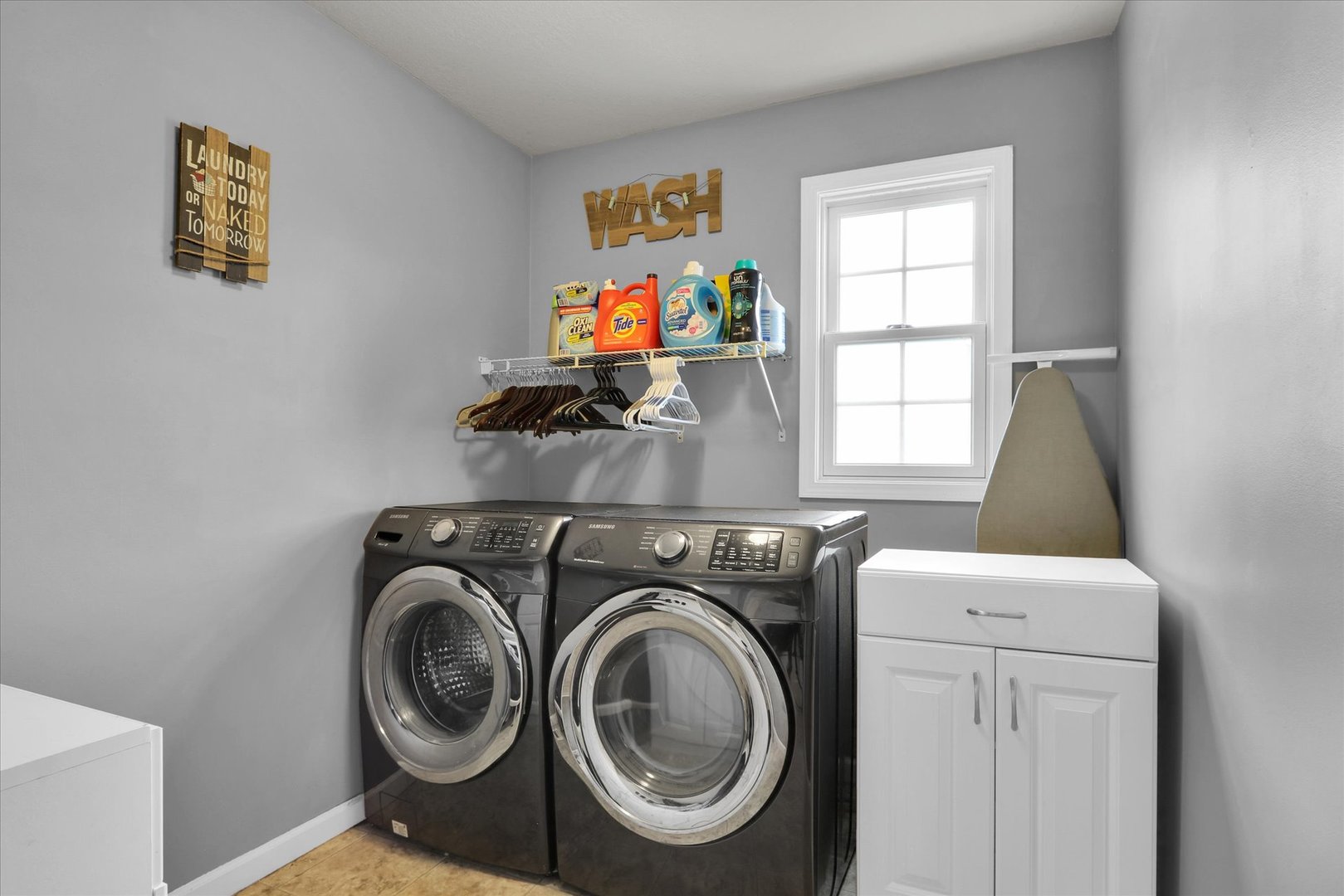 3808 Pebblebrook Lane Champaign, IL 61822 - Photo 17 of 31 a utility room with dryer washer and a window