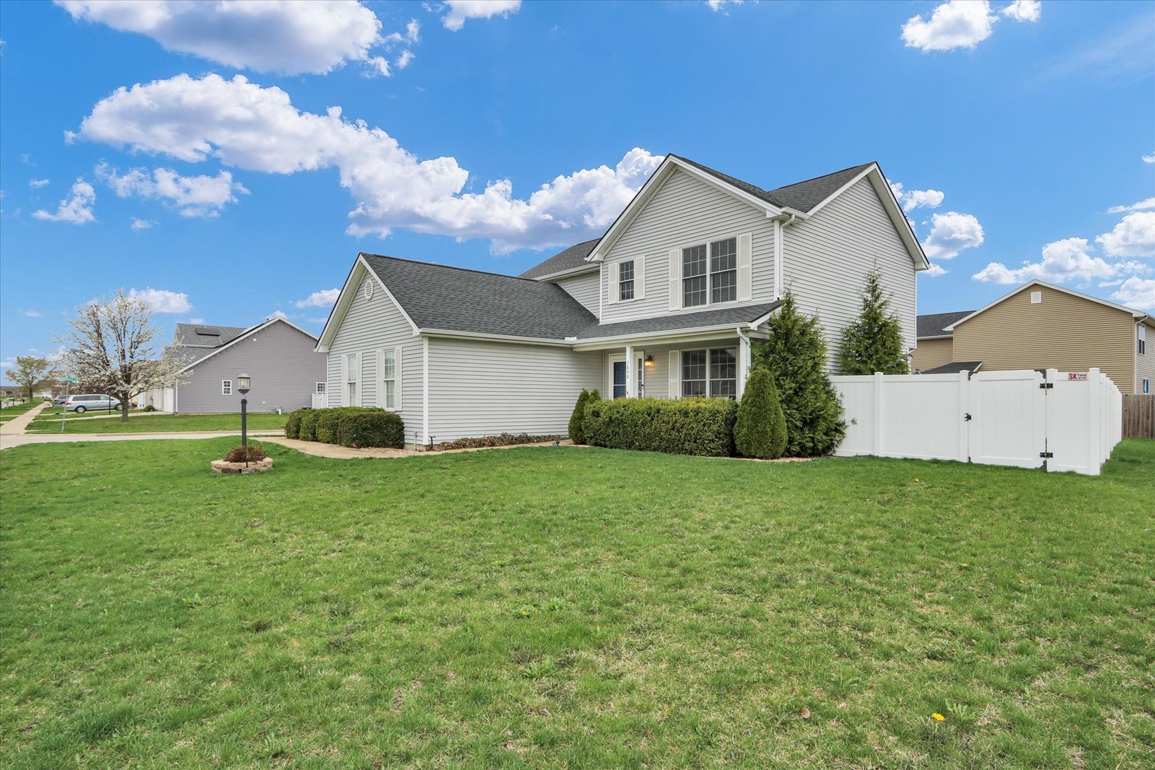 3808 Pebblebrook Lane Champaign, IL 61822 - Photo 2 of 31 a view of a house with backyard and garden