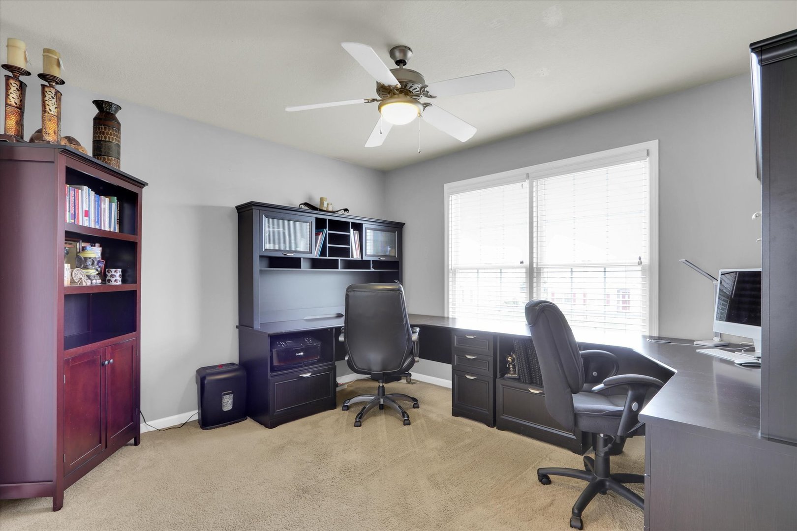 3808 Pebblebrook Lane Champaign, IL 61822 - Photo 21 of 31 a view of a workspace with furniture and a window