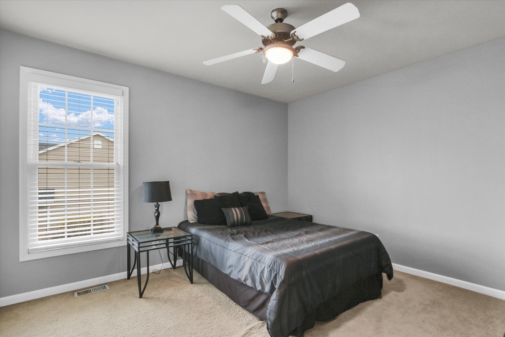 3808 Pebblebrook Lane Champaign, IL 61822 - Photo 24 of 31 a bedroom with a bed and a window