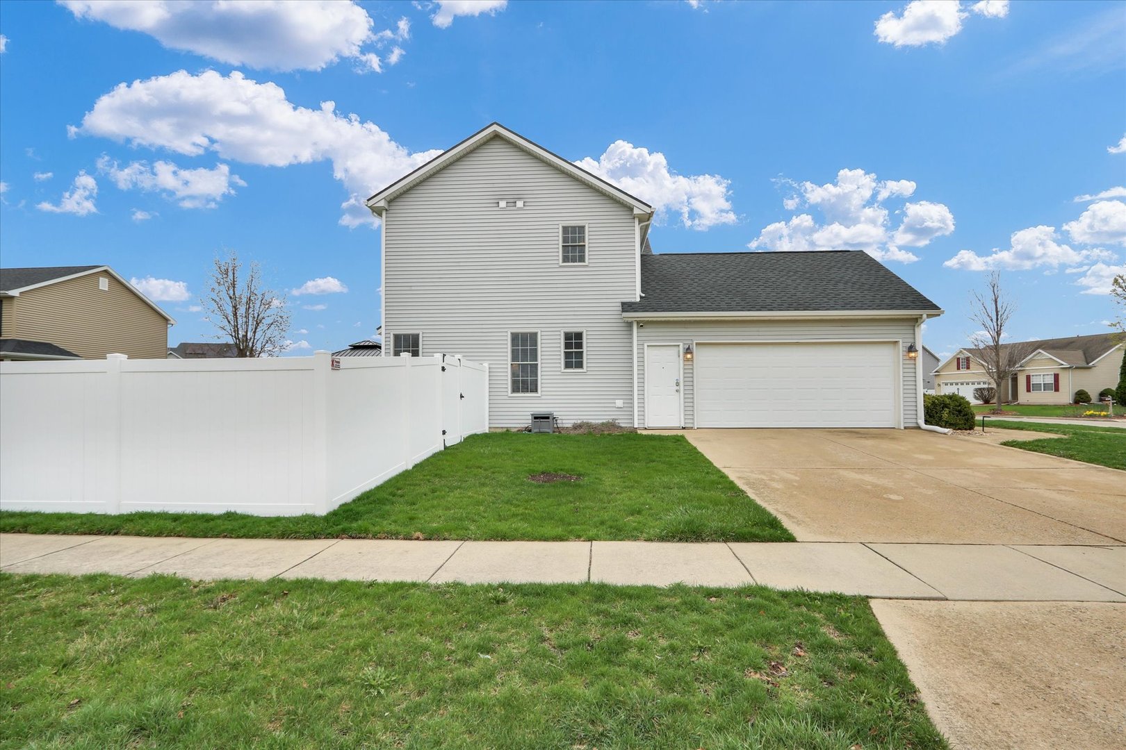 3808 Pebblebrook Lane Champaign, IL 61822 - Photo 30 of 31 a front view of a house with garden