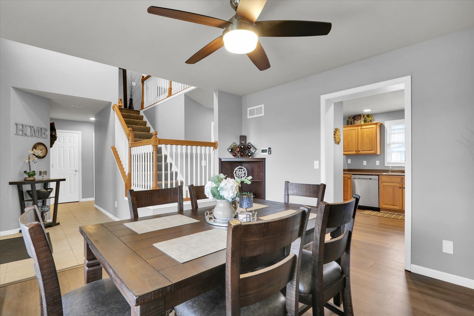 3808 Pebblebrook Lane Champaign, IL 61822 - Photo 4 of 31 a view of a dining room with furniture and wooden floor