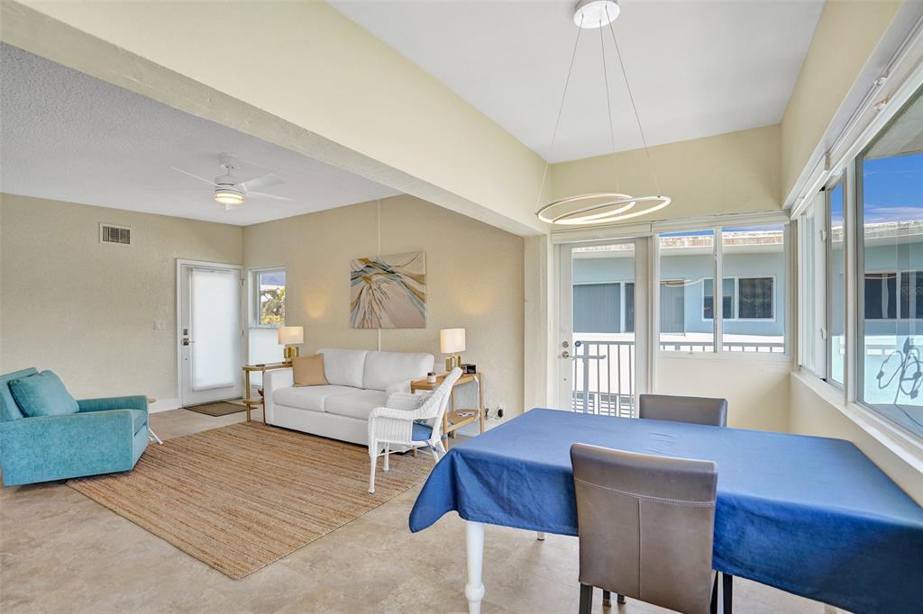 5700 Old Ocean Boulevard, Unit X Ocean Ridge, FL 33435 - Photo 21 of 49 a living room with furniture and wooden floor