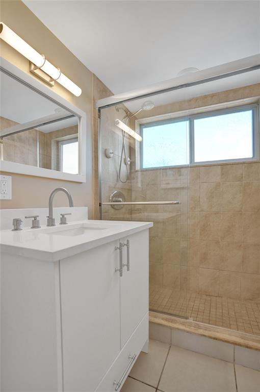 5700 Old Ocean Boulevard, Unit X Ocean Ridge, FL 33435 - Photo 24 of 49 a bathroom with a sink and a mirror