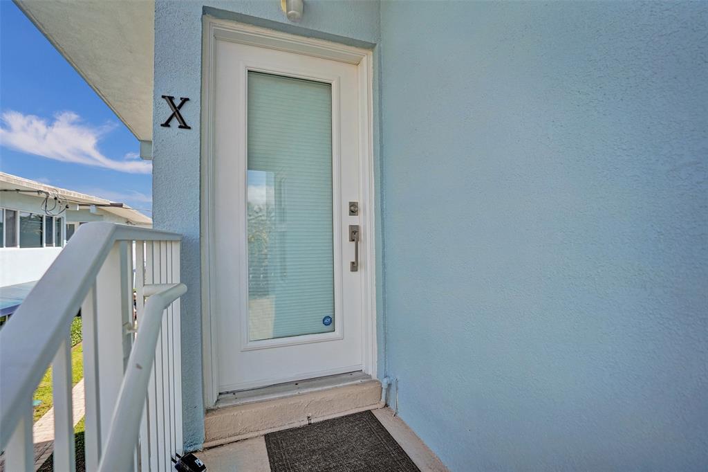 5700 Old Ocean Boulevard, Unit X Ocean Ridge, FL 33435 - Photo 3 of 49 a view of an entryway with staircase