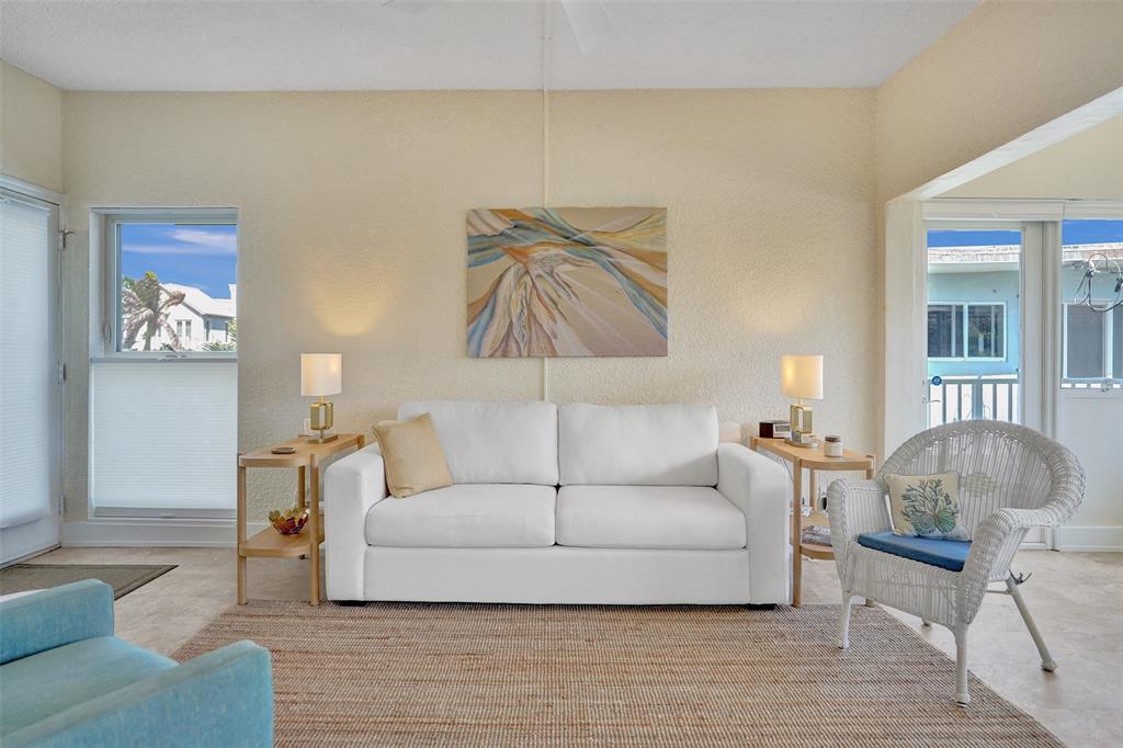 5700 Old Ocean Boulevard, Unit X Ocean Ridge, FL 33435 - Photo 8 of 49 a living room with furniture and a couch