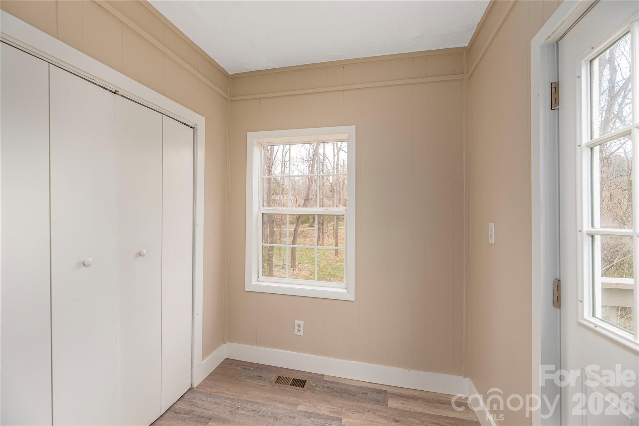 448 Sand Hill Road Asheville, NC 28806 - Photo 12 of 24 an empty room with windows