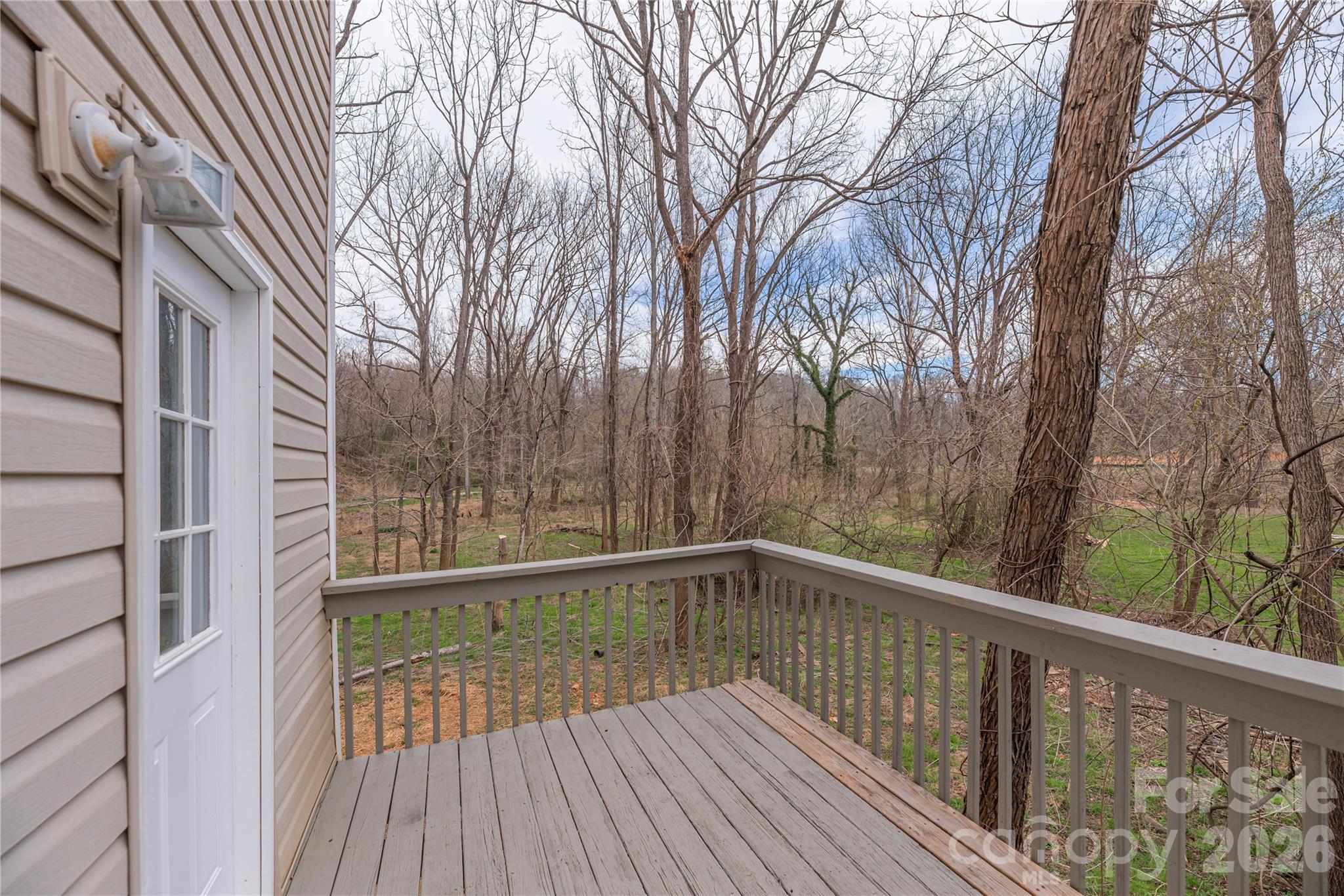 448 Sand Hill Road Asheville, NC 28806 - Photo 13 of 24 a view of a balcony with trees