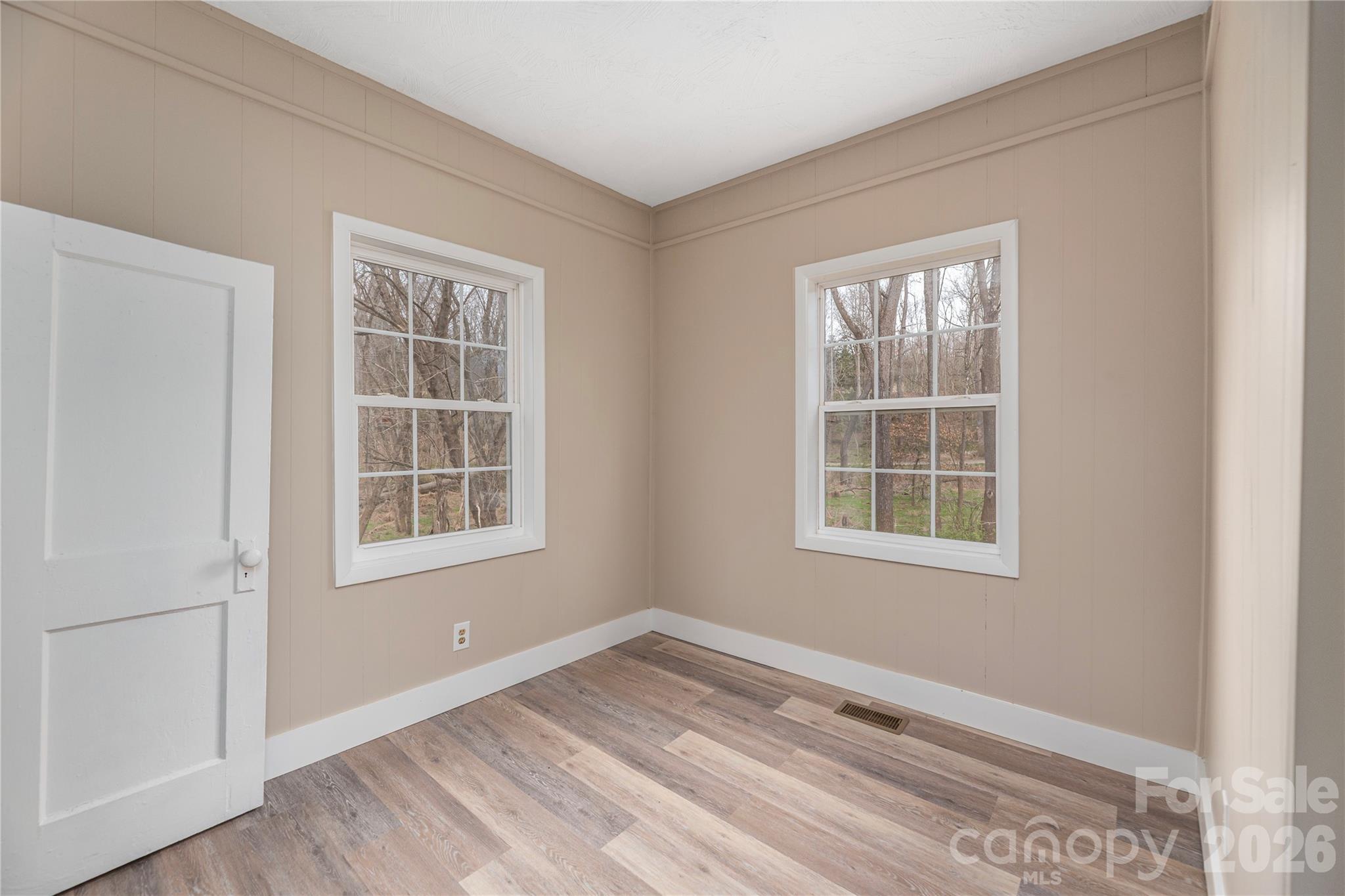 448 Sand Hill Road Asheville, NC 28806 - Photo 8 of 24 an empty room with a window
