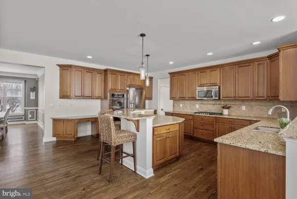 a kitchen with a sink cabinets and window