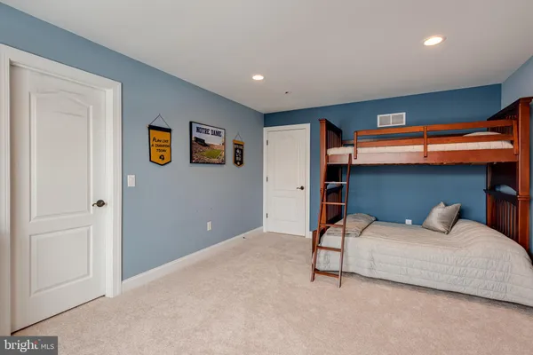 a bedroom with a bed and furniture