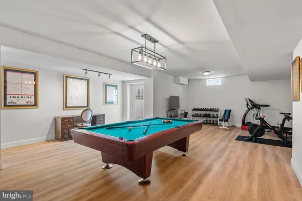 a bed room with furniture and a table