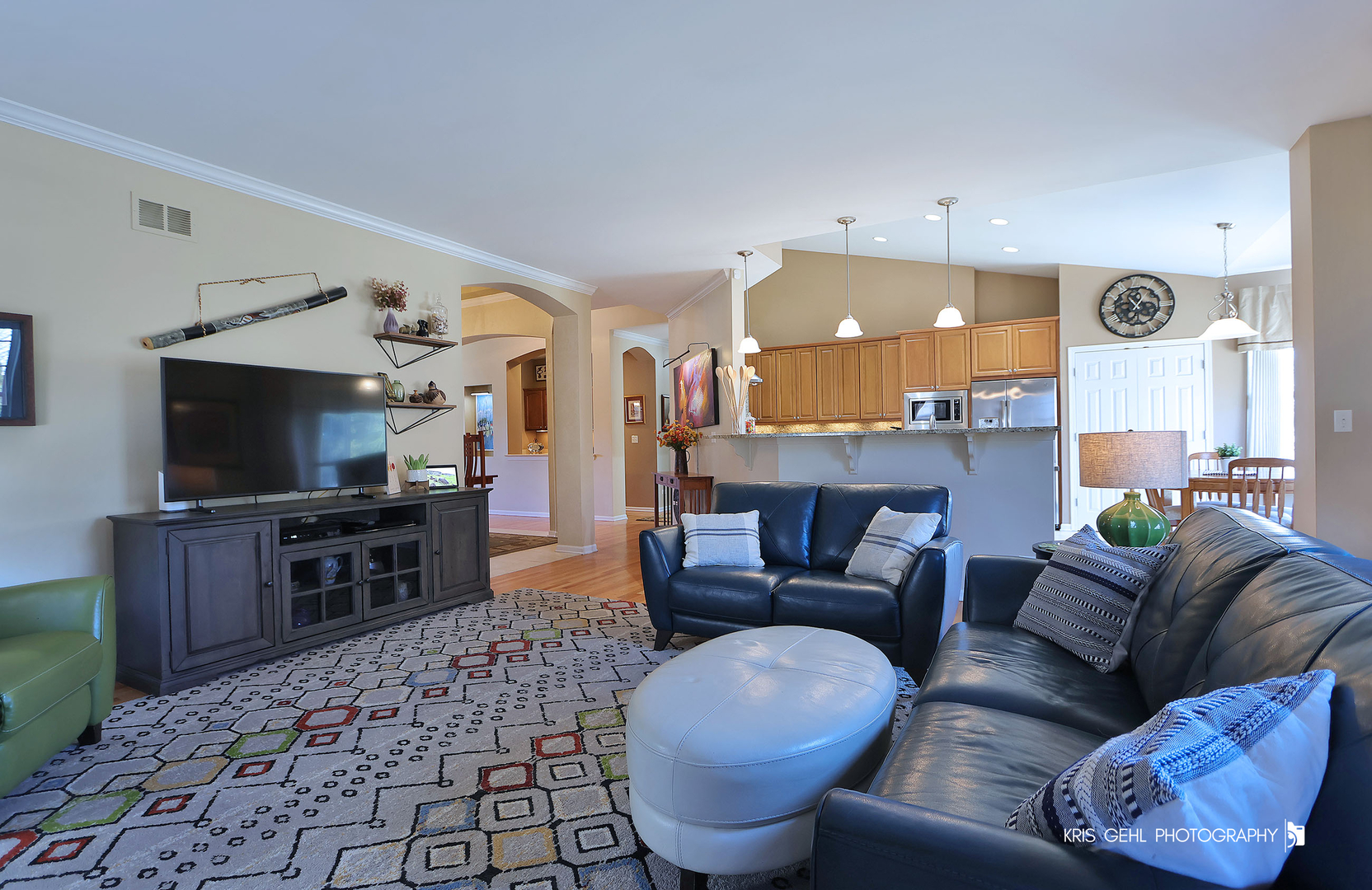 317 Sterling Circle Cary, IL 60013 - Photo 11 of 47 a living room with furniture and a flat screen tv