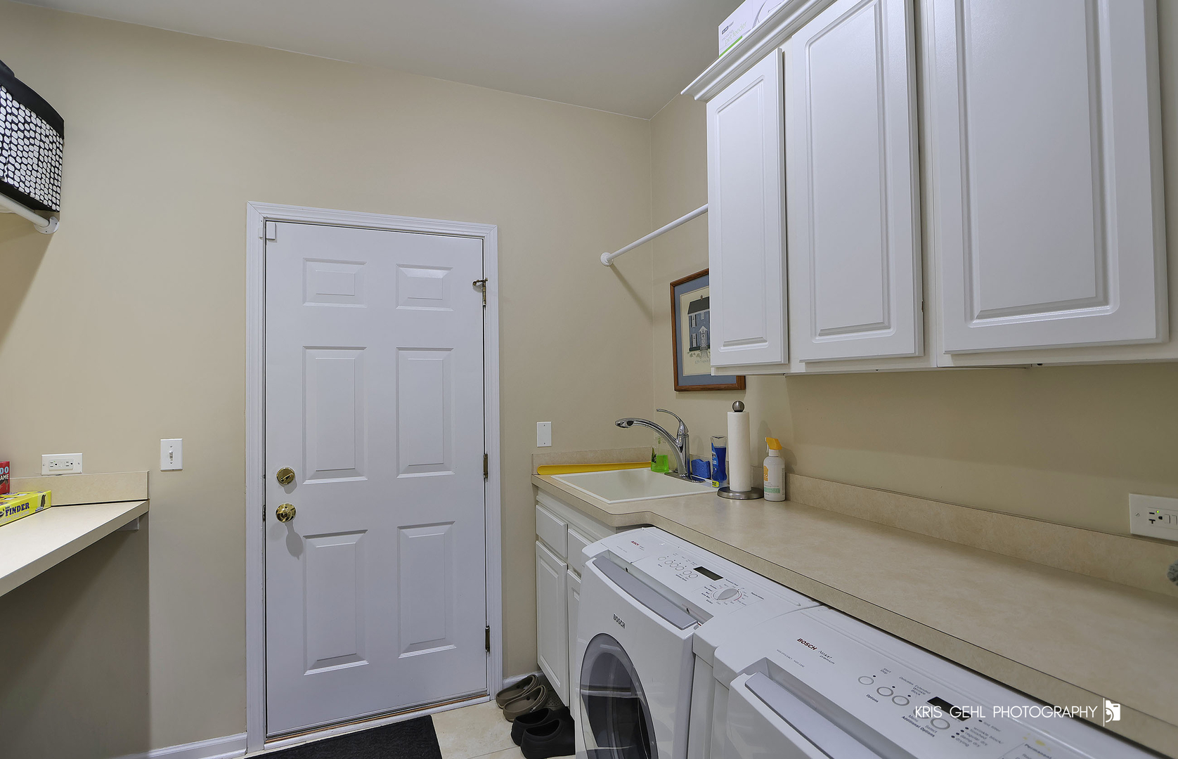 317 Sterling Circle Cary, IL 60013 - Photo 26 of 47 a view of a kitchen with white cabinets