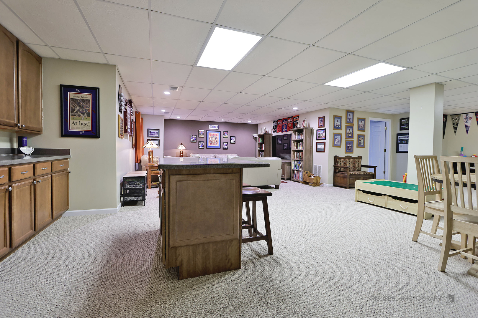 317 Sterling Circle Cary, IL 60013 - Photo 27 of 47 a living room with furniture and a kitchen appliance