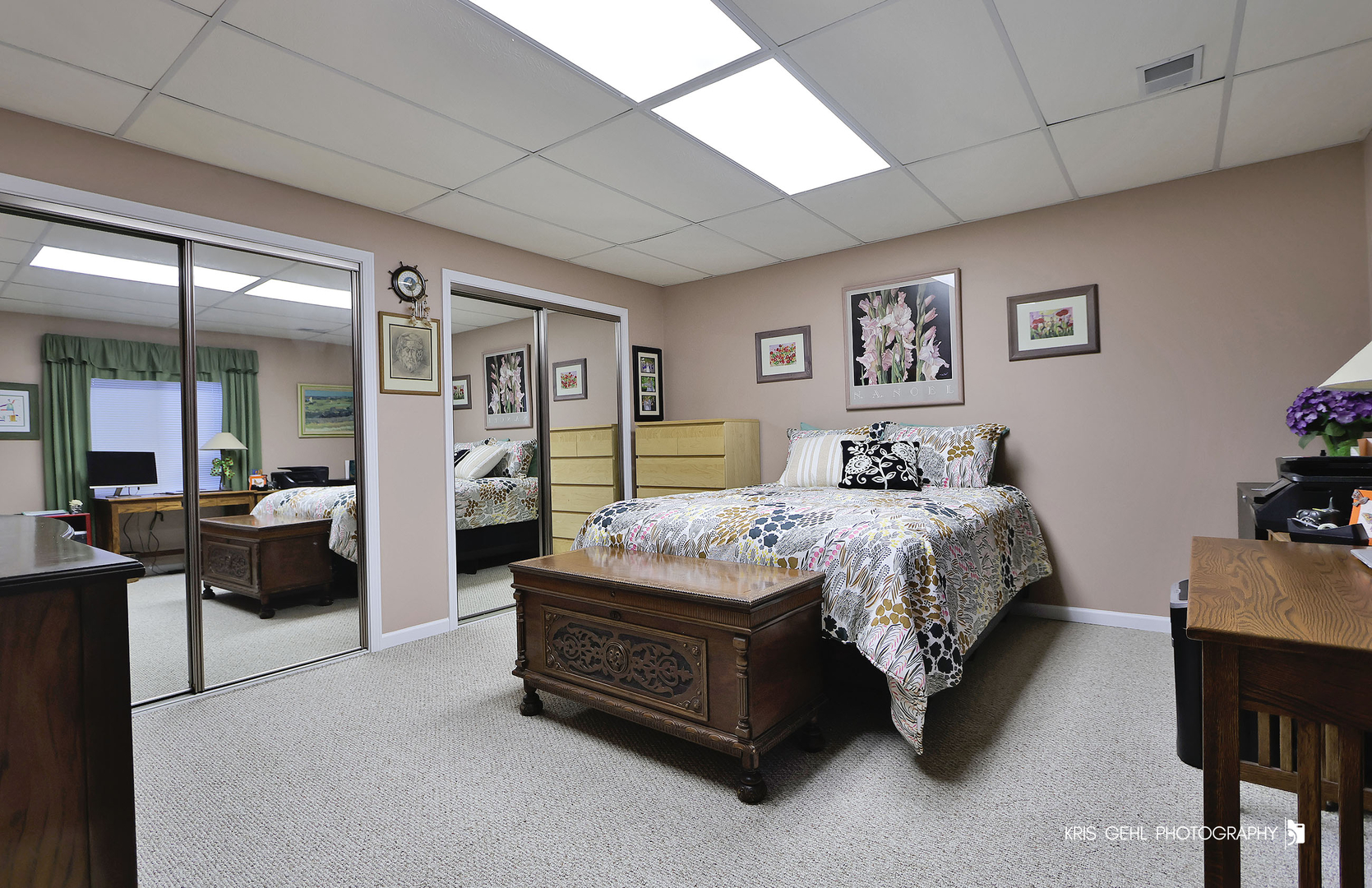 317 Sterling Circle Cary, IL 60013 - Photo 32 of 47 a spacious bedroom with a bed a table and a dresser