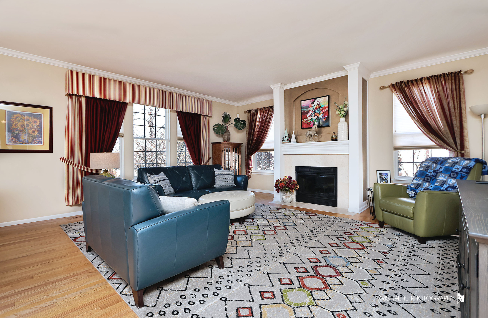 317 Sterling Circle Cary, IL 60013 - Photo 10 of 47 a living room with furniture a large window and a fireplace