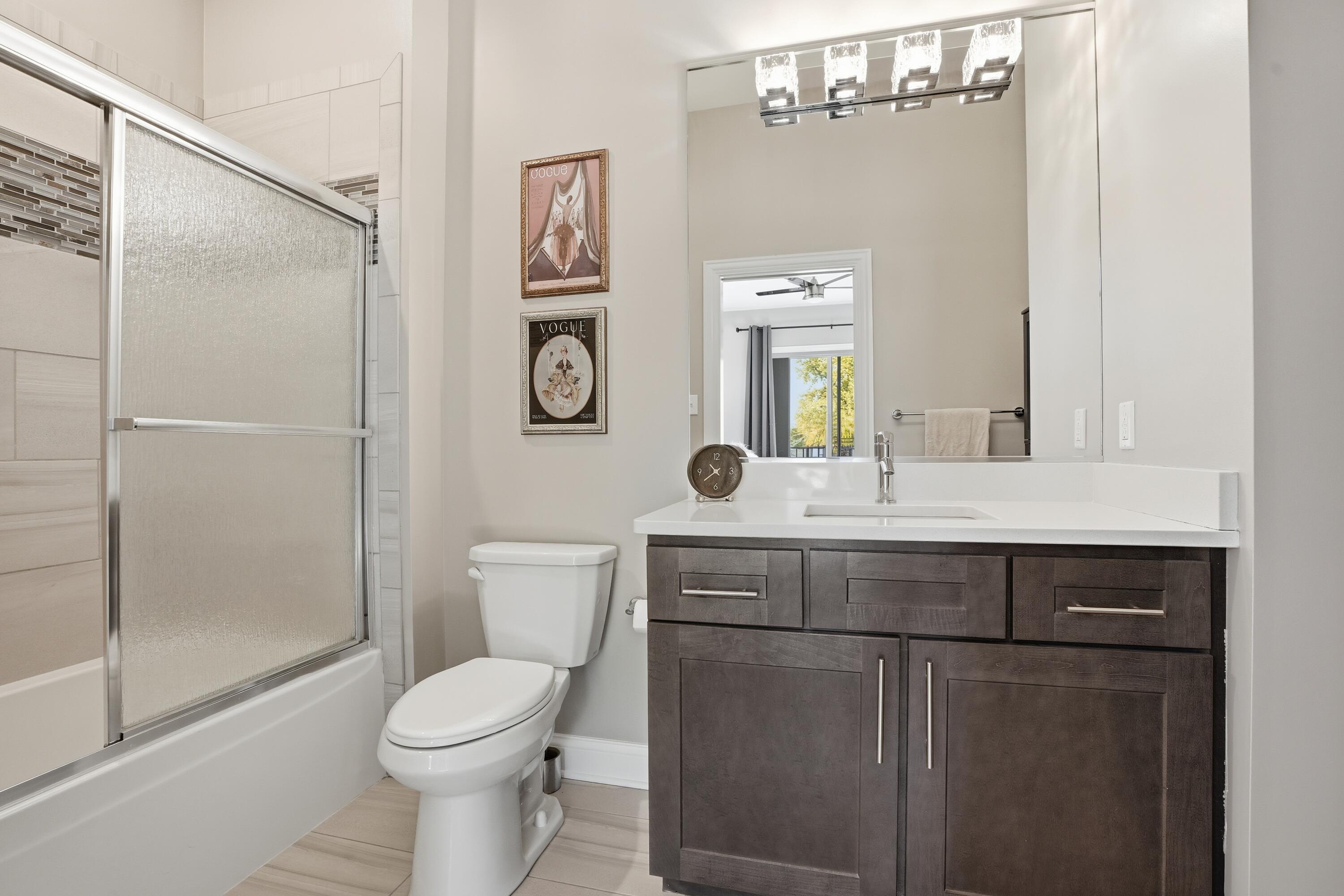 310 North Indiana Avenue Crown Point, IN 46307 - Photo 18 of 29 a bathroom with a sink a toilet and shower