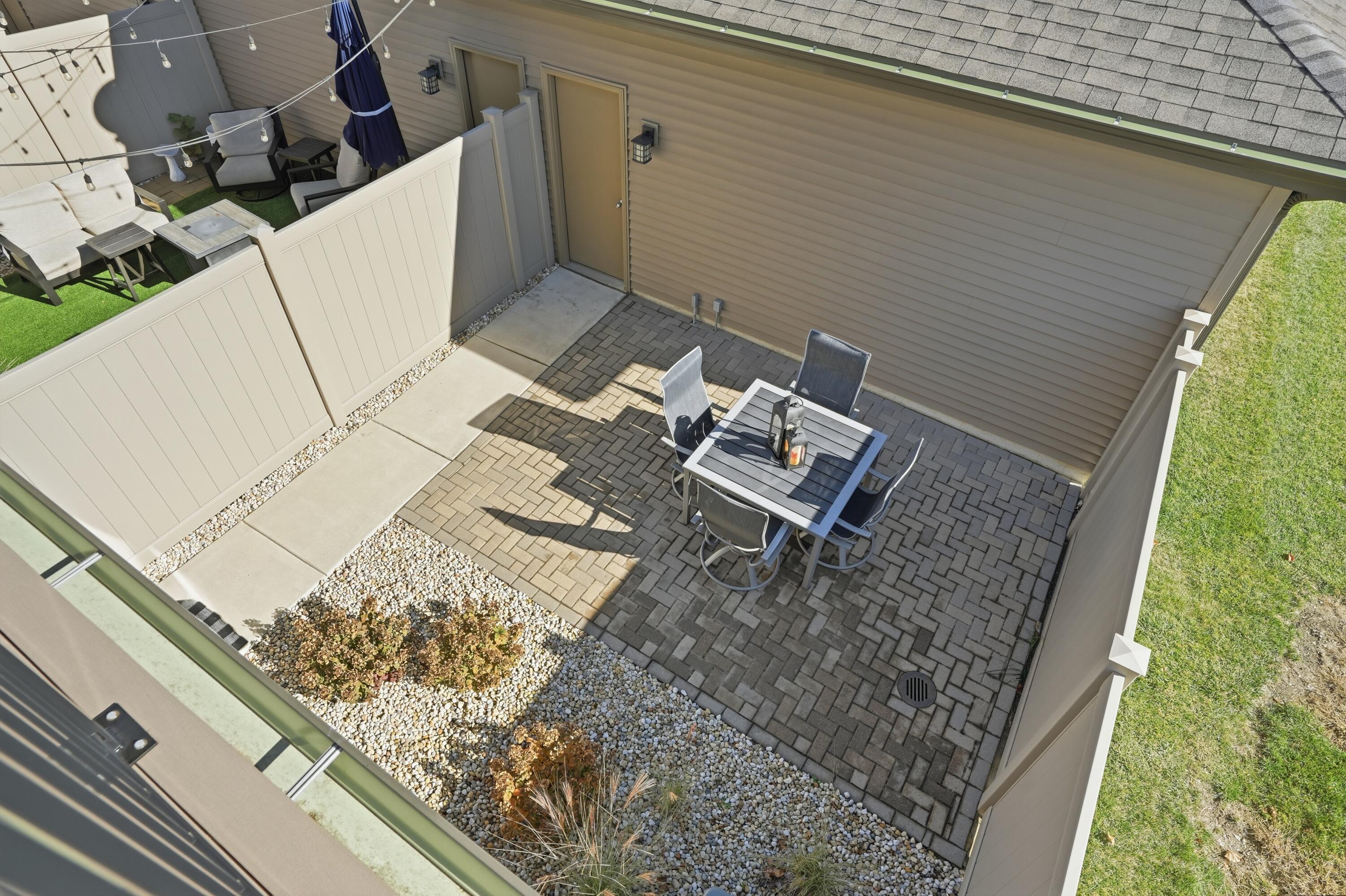 310 North Indiana Avenue Crown Point, IN 46307 - Photo 26 of 29 a view of a terrace with wooden floor and fence