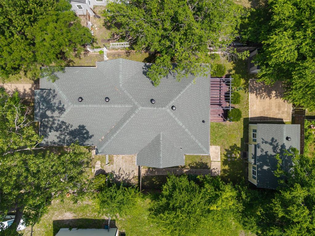 5824 Boone Street Sachse, TX 75048 - Photo 35 of 40 an aerial view of a house with a yard