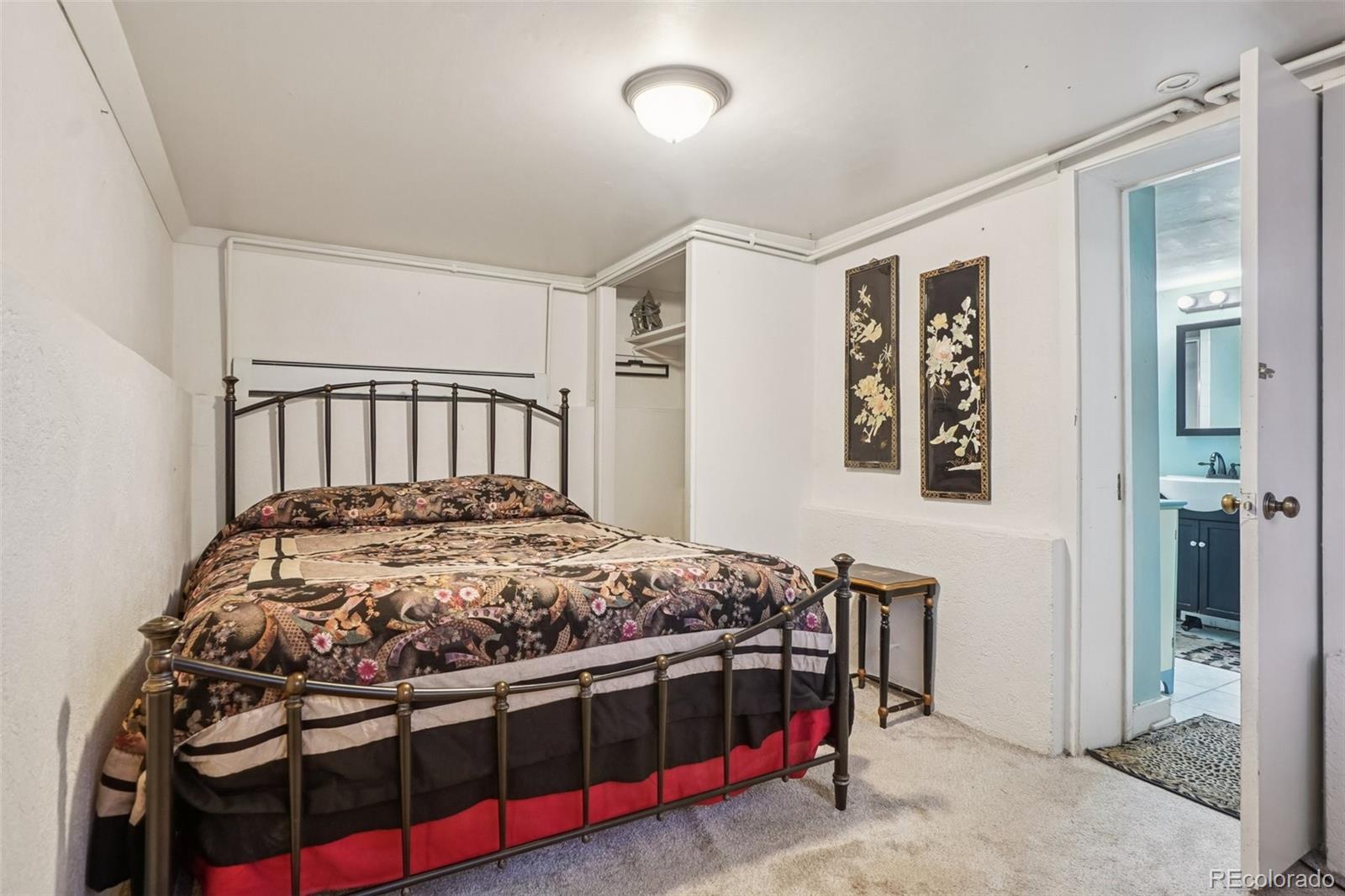 9025 Picabo Road Cascade, CO 80809 - Photo 34 of 44 a bedroom with a bed and a window