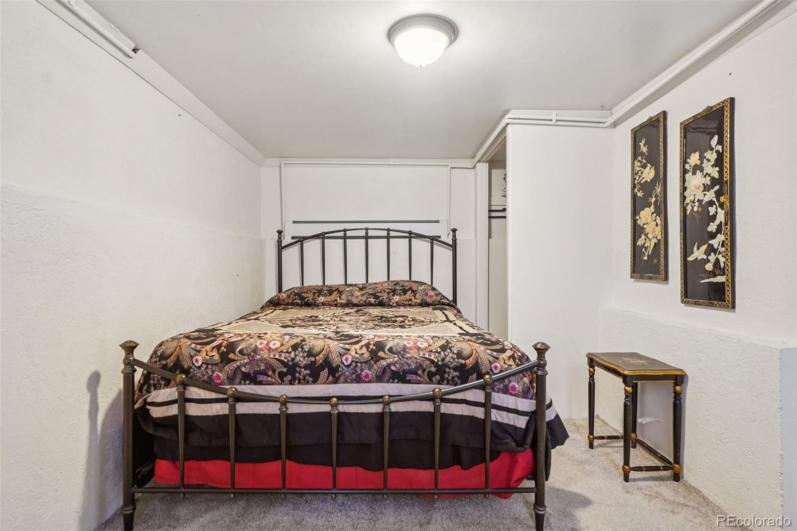 9025 Picabo Road Cascade, CO 80809 - Photo 35 of 44 a bedroom with a bed and a window