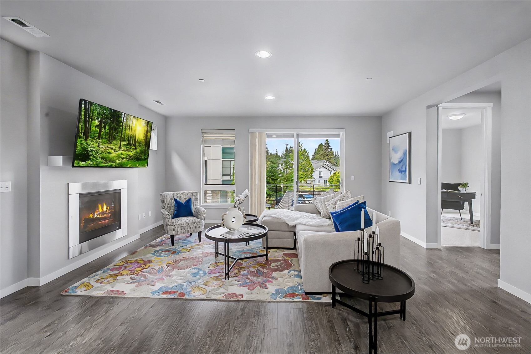 130 198th Street Southeast, Unit 5 Bothell, WA 98012 - Photo 16 of 40 a living room with furniture and a fireplace
