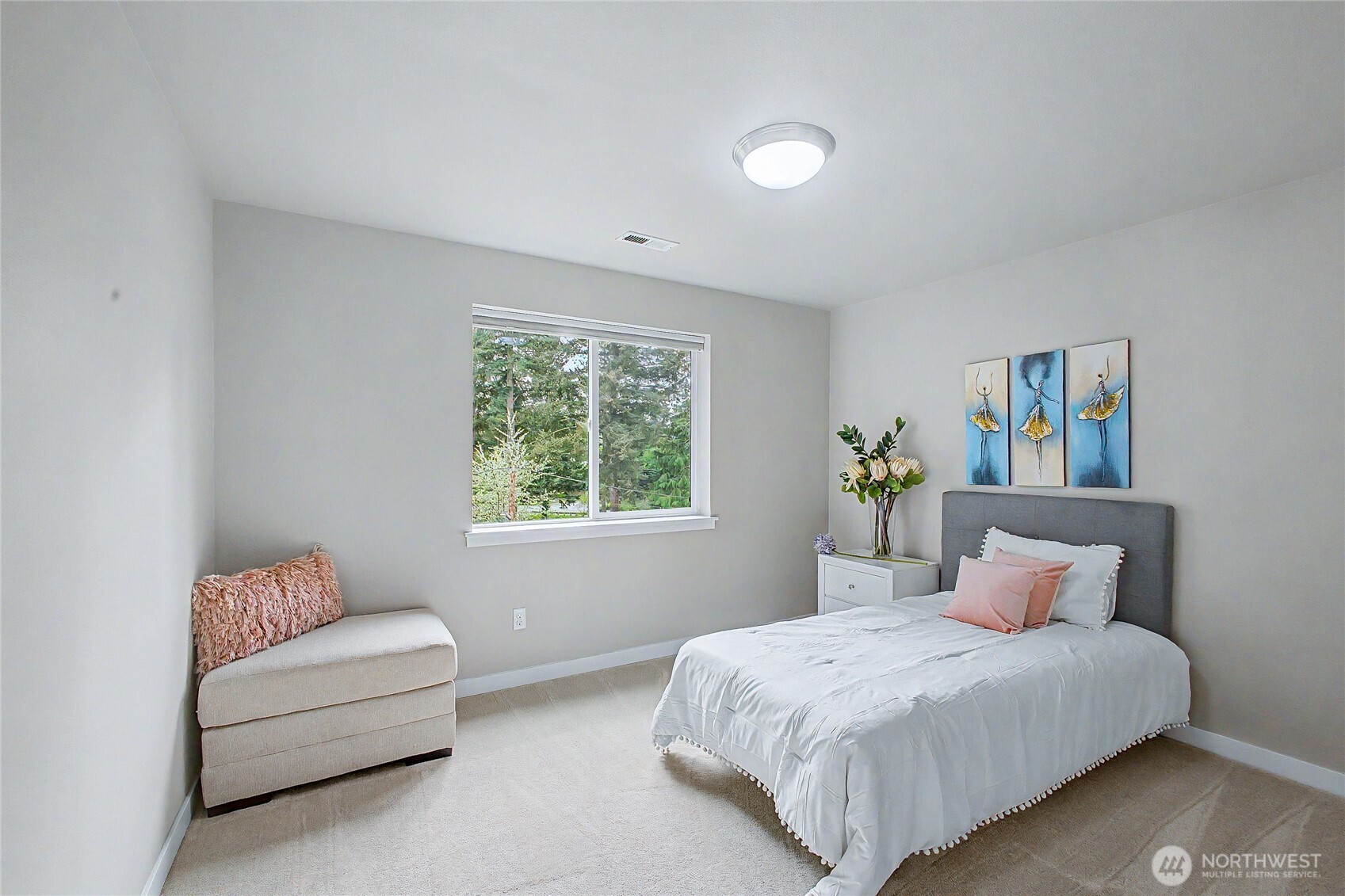 130 198th Street Southeast, Unit 5 Bothell, WA 98012 - Photo 32 of 40 a bedroom with a bed and a couch