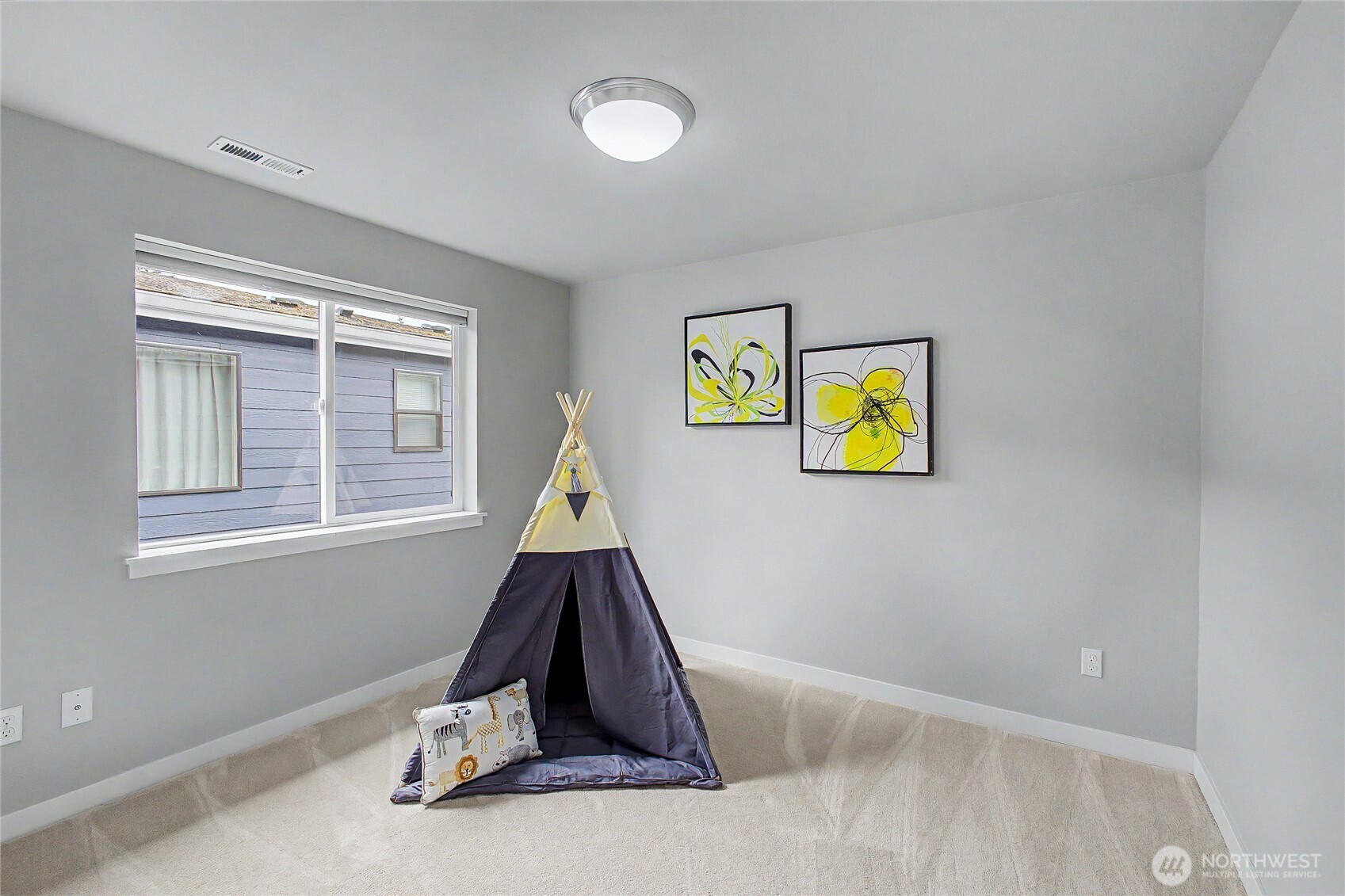 130 198th Street Southeast, Unit 5 Bothell, WA 98012 - Photo 33 of 40 a view of a bedroom with a slide