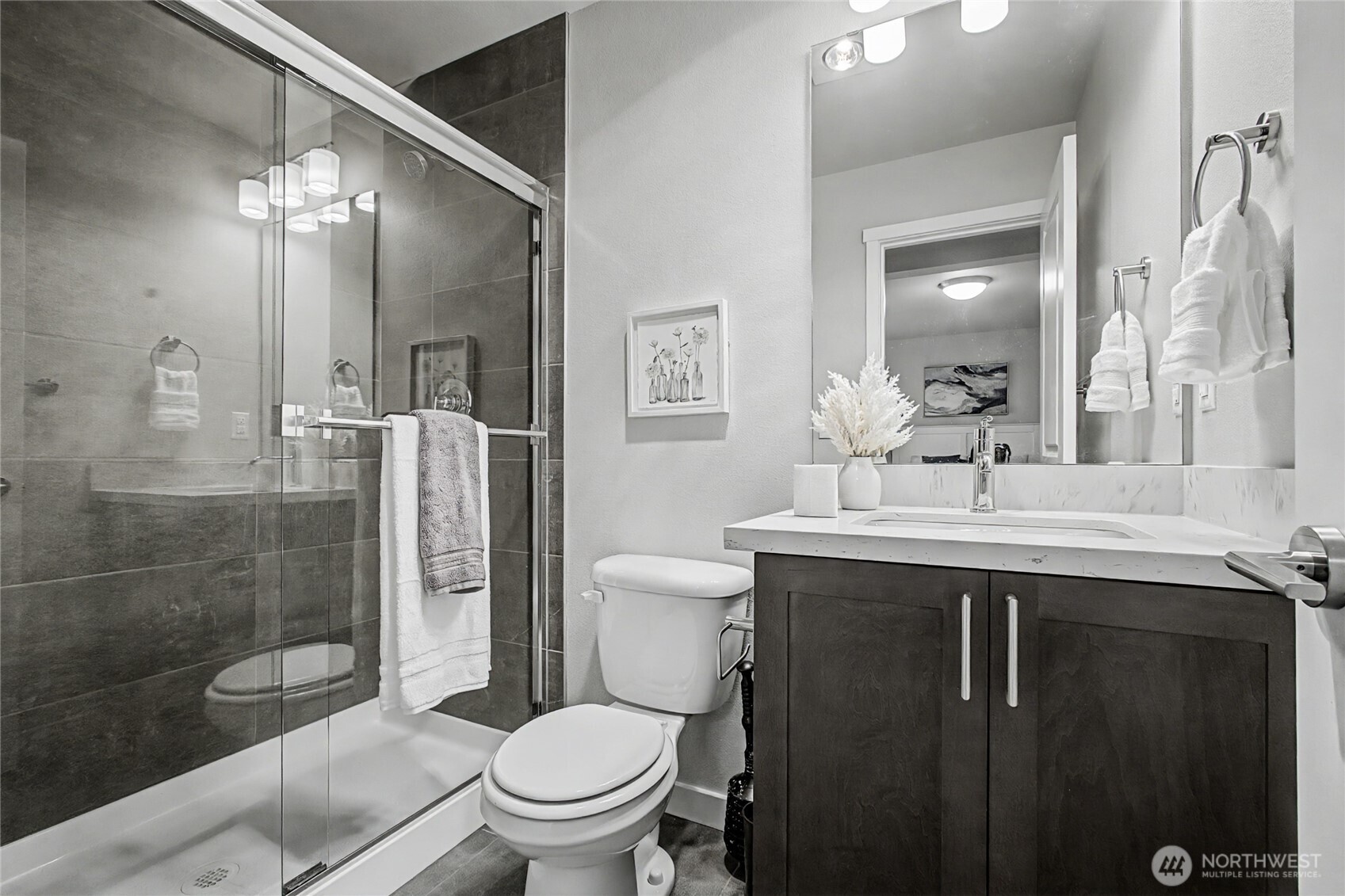 130 198th Street Southeast, Unit 5 Bothell, WA 98012 - Photo 36 of 40 a bathroom with a sink toilet and shower