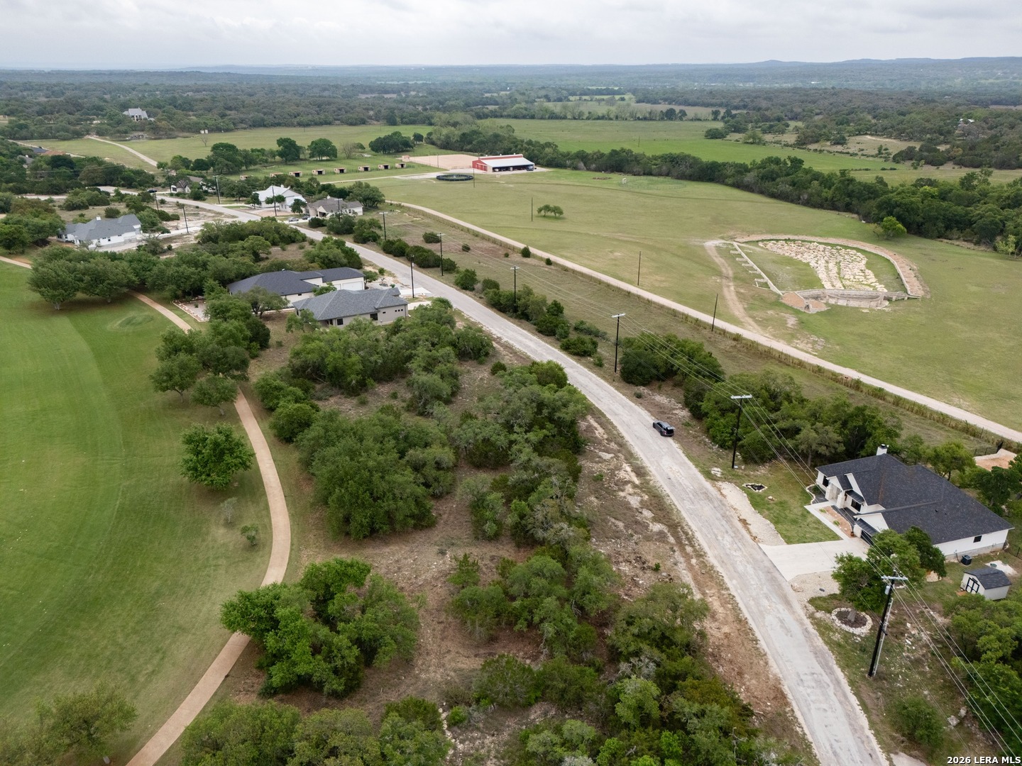 401 George Dolson Blanco, TX 78606 - Photo 12 of 19 an aerial view of a city with mountains