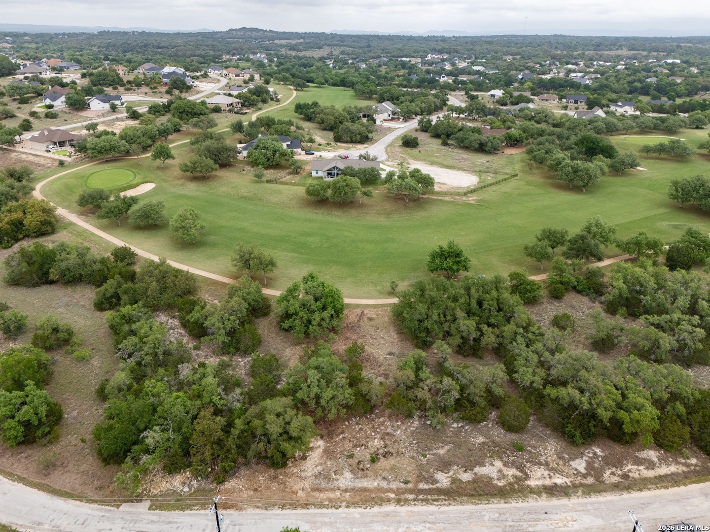 401 George Dolson Blanco, TX 78606 - Photo 19 of 19 an aerial view of residential houses with outdoor space and trees