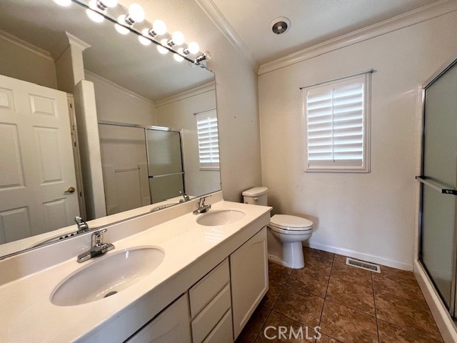 27600 Atlantic Avenue, Unit 427 Highland, CA 92346 - Photo 16 of 20 a bathroom with a sink and a mirror