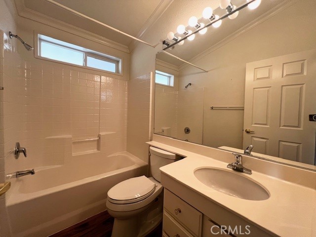 27600 Atlantic Avenue, Unit 427 Highland, CA 92346 - Photo 19 of 20 a bathroom with a sink a toilet and shower
