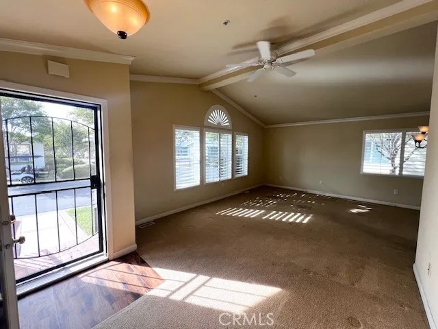 a view of an empty room and window