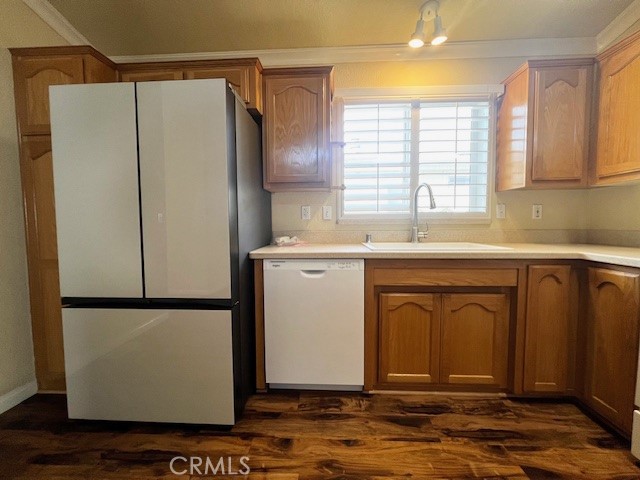 27600 Atlantic Avenue, Unit 427 Highland, CA 92346 - Photo 10 of 20 a kitchen with stainless steel appliances granite countertop a refrigerator and a sink